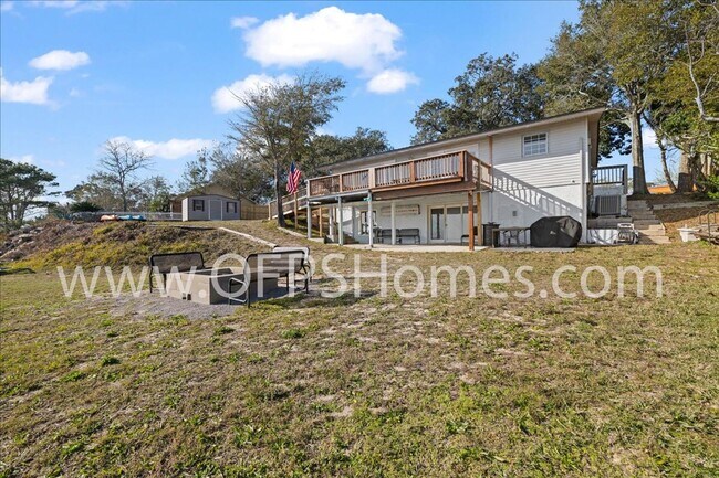 Building Photo - Stunning 4-Bedroom, 3-Bath Waterfront Home in Choctaw Beach – 140ft of Bayfront Bliss!