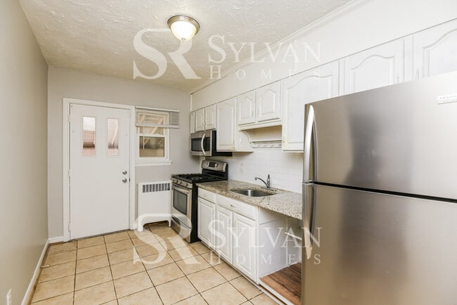 Building Photo - Proper Design. Smartly Priced. Ready for Move-In!