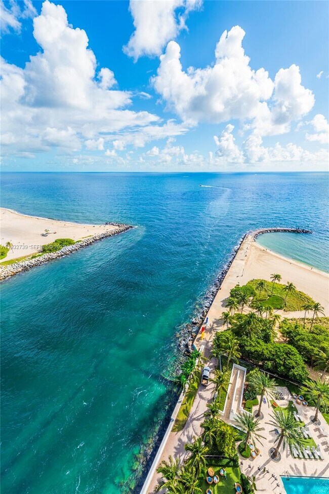 Building Photo - 10295 Collins Ave