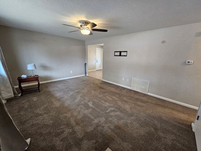 Building Photo - Welcome home to this maintained 4-bedroom, 2-bath Home in 80909!