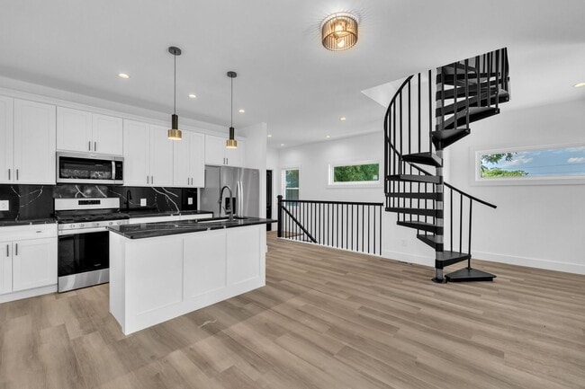 Building Photo - Modern New Construction Townhome with Roof...