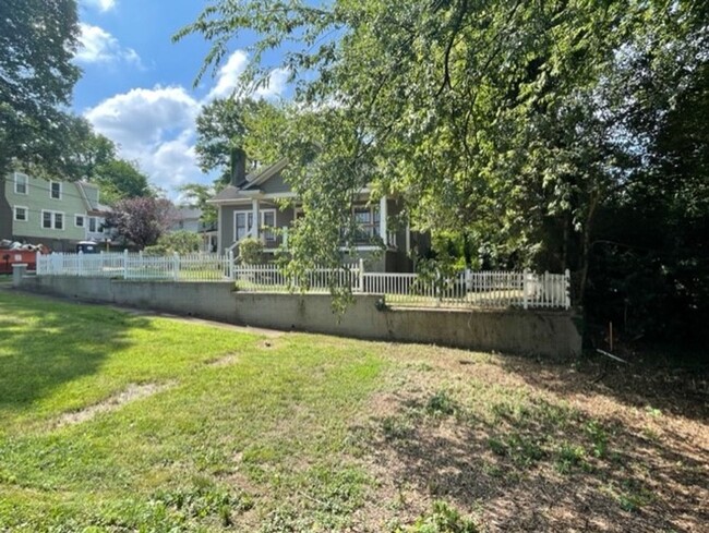 Building Photo - Introducing WesleyHeights401, a charming 3...