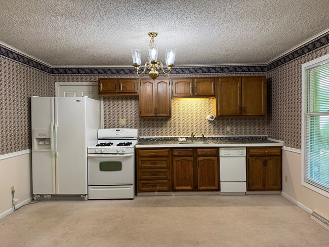 Building Photo - Beautiful Duplex Located in Serene, Wooded...
