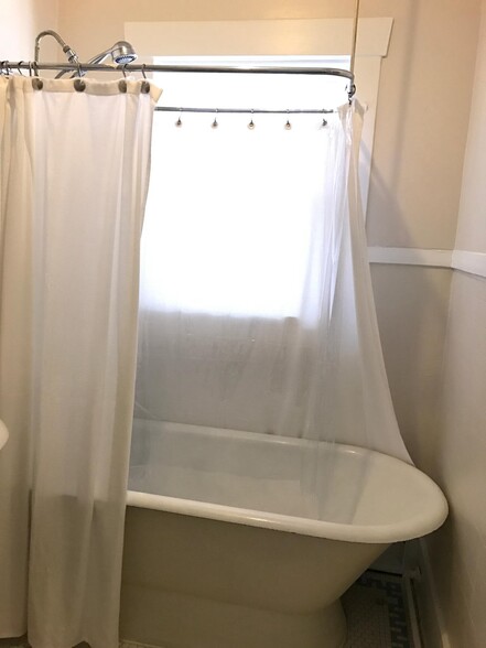 Claw foot type tub and shower - 812 Branard St
