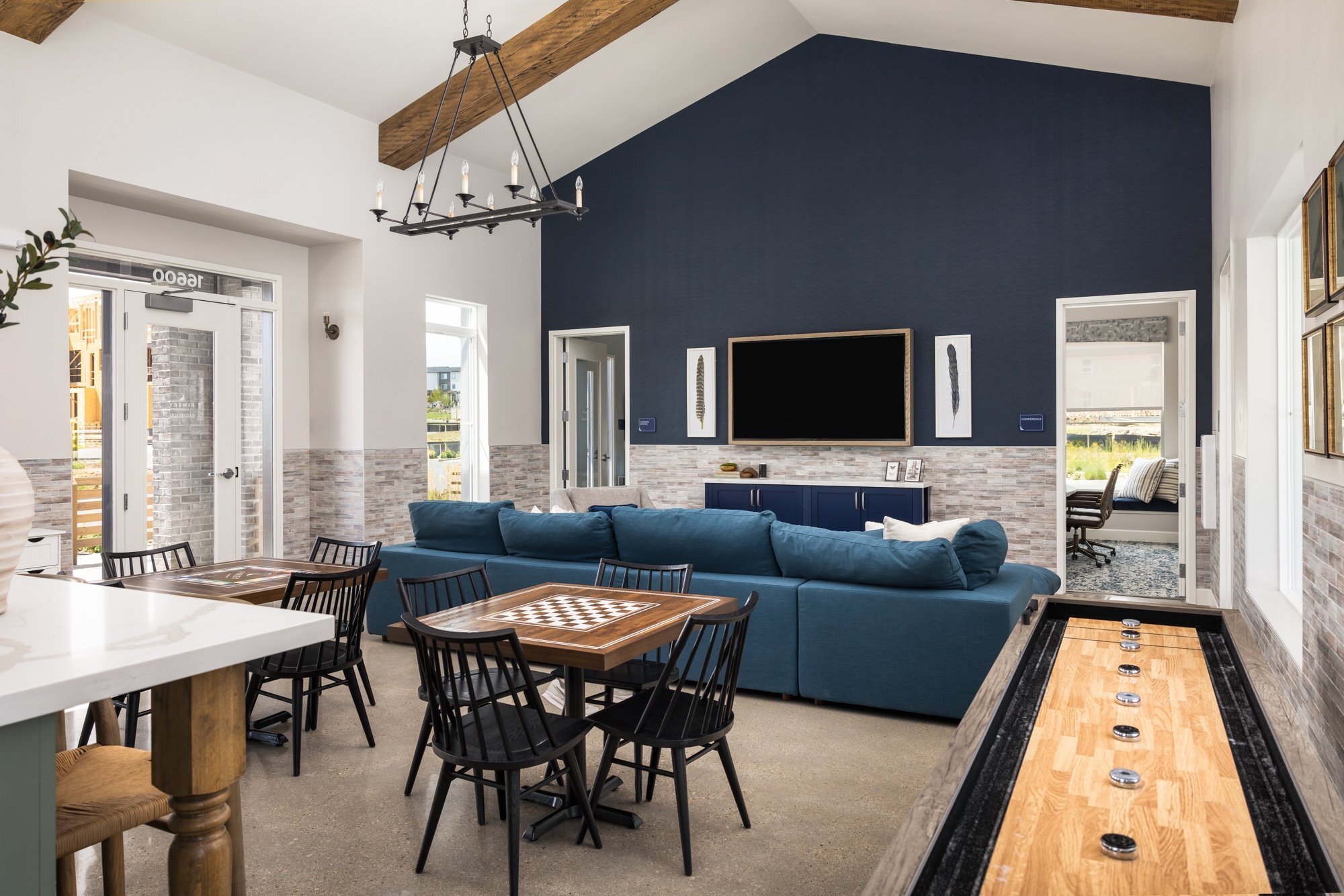 Clubhouse with TV, Games and Conference Room - Finley at Baseline Townhomes