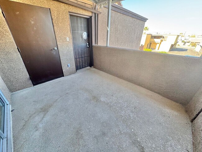 Building Photo - BRIGHT 2-BEDROOM CONDO NEAR STRIP & UNLV W/ PRIVATE BALCONY