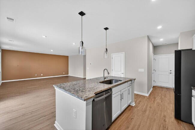 Building Photo - Like-New Harlem Home!