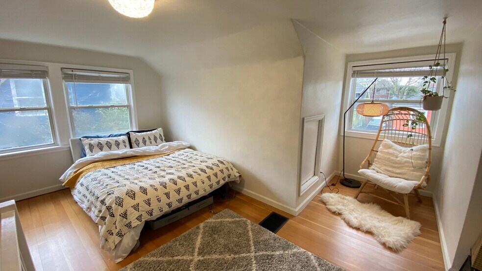 Choose your main bedroom upstairs... - 451 NE Sumner St