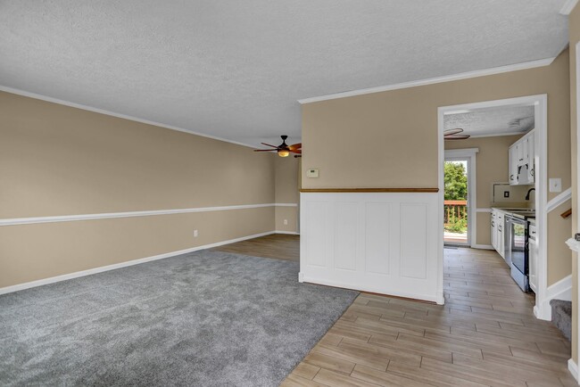 Building Photo - Spacious 4-Level Home with Deck, Workshop ...