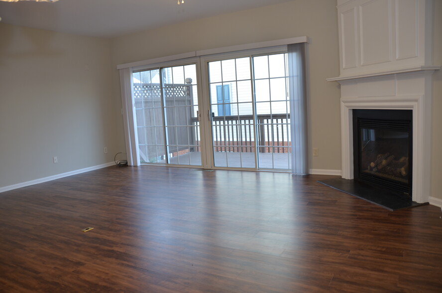 Living Room with double french doors opening to Deck - 1303 Greychurch Way