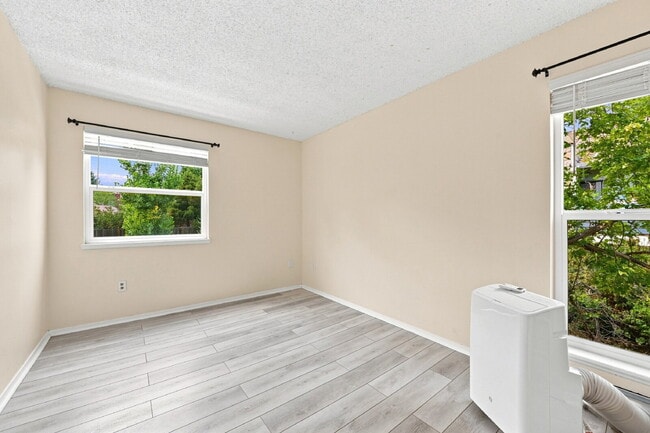 Building Photo - $1,340.95 with $300 off the first month's rent, 2 Beds - 1 Bath, Condoi in Aurora with Wall A/C!