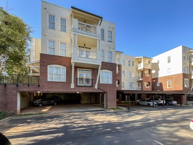 Building Photo - COMING SOON! Charlotte Living at Its Best! 2BR/2BA End Unit + Chef’s Kitchen & Water Included!