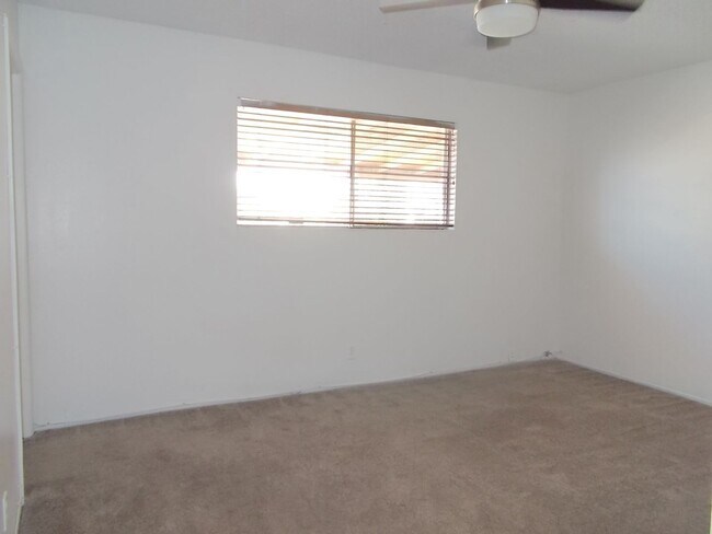 Building Photo - 4-Bedroom Home with Spacious Backyard