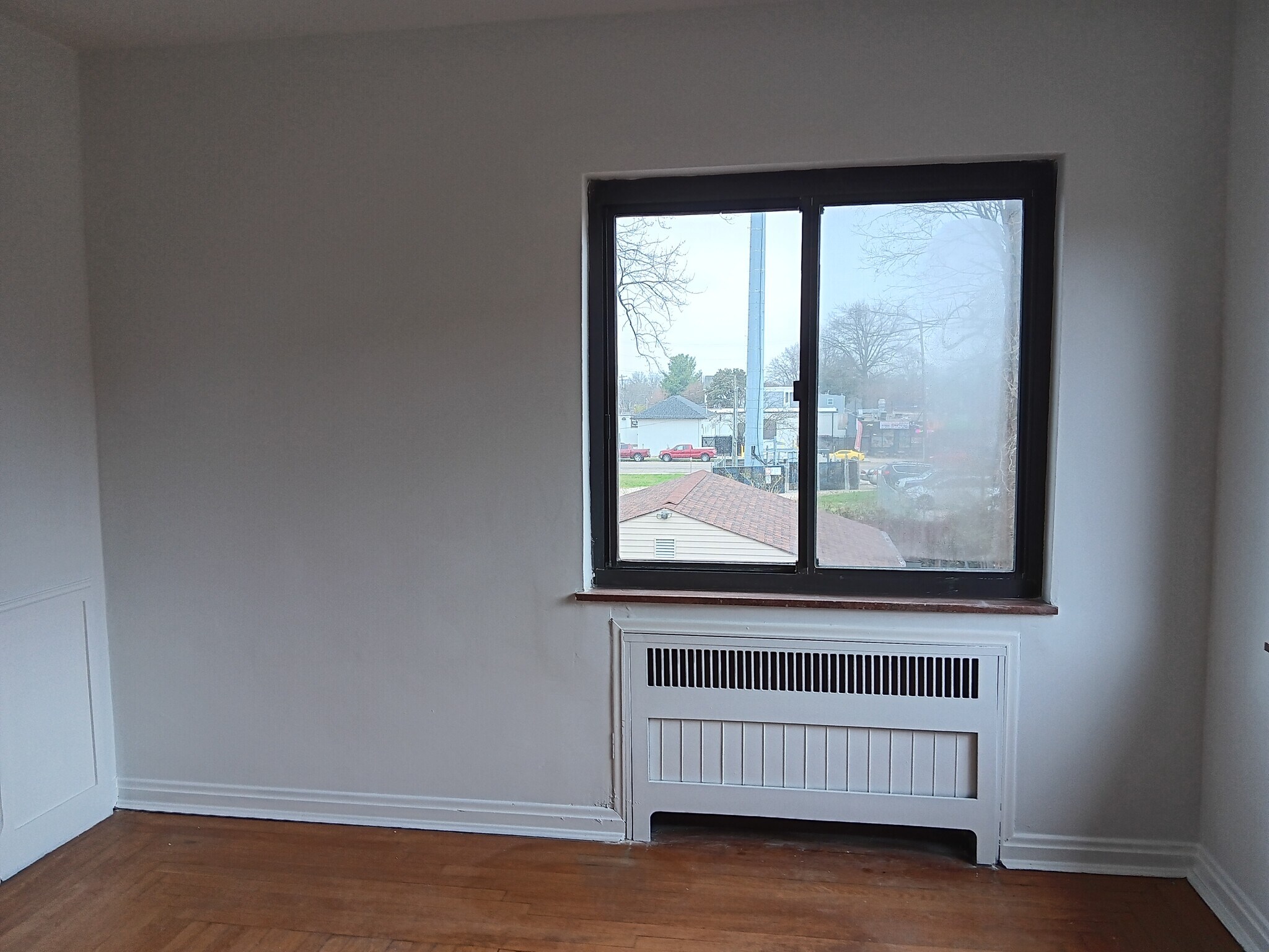 Living room side window, newly painted room - 4525 Roth Ave