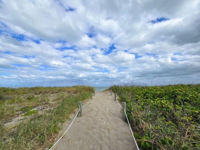 Building Photo - OCEANFRONT FURNISHED ANNUAL ONE BEDROOM ONE BATH