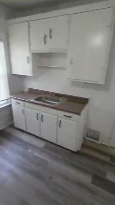 Building Photo - Spacious 1-Bed Duplex with French Doors to Master Bedroom