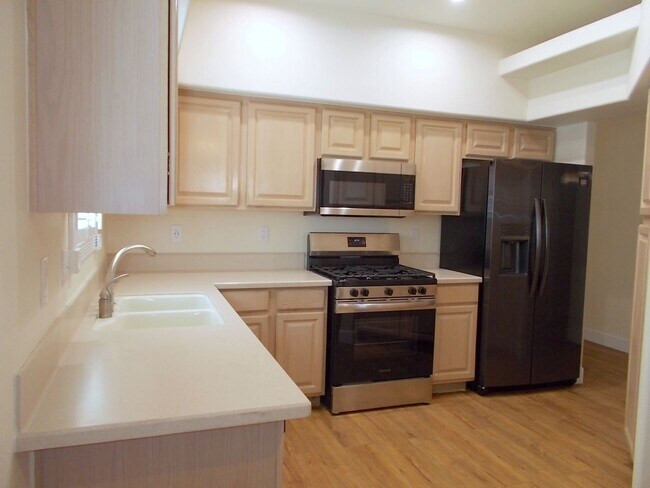 Building Photo - Charming Home in Gated Melrose Park Estates with Dual Fireplaces & Covered Patio