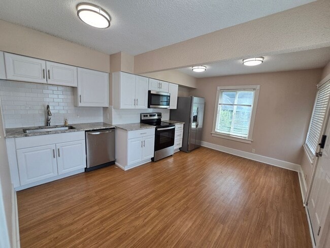 Building Photo - large three bedroom house with extra living space and finished basement