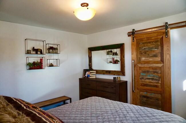 Bedroom with eastern exposure - 201 NW Harriman St