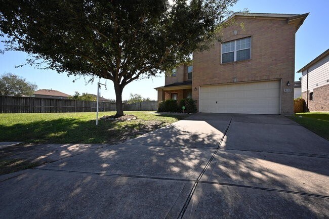 Building Photo - 9403 Coatsworth Dr