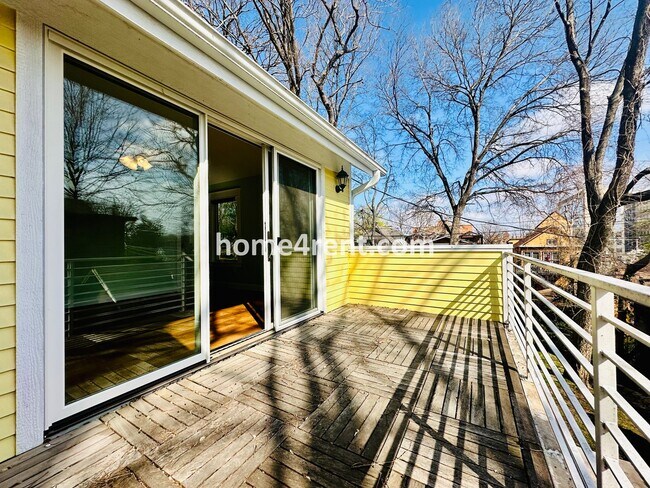 Building Photo - Charming Home Near Country Club Plaza w/ Gorgeous Updates, Wood Floors and a Two Car Garage!