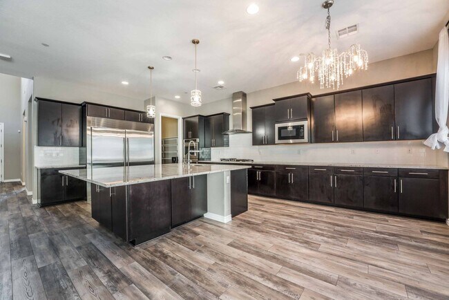 Building Photo - A stunning 4 Bedroom home nestled in the prestigious community in Henderson!