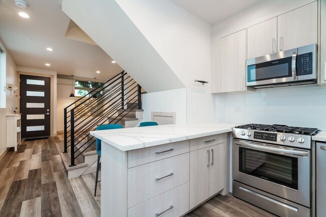 Building Photo - Stylish 3 Bedroom with Rooftop Decks and Dedicated Parking