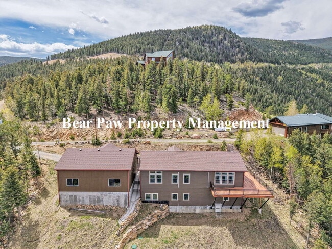 Building Photo - "Experience Mountain Living either FURNISH...