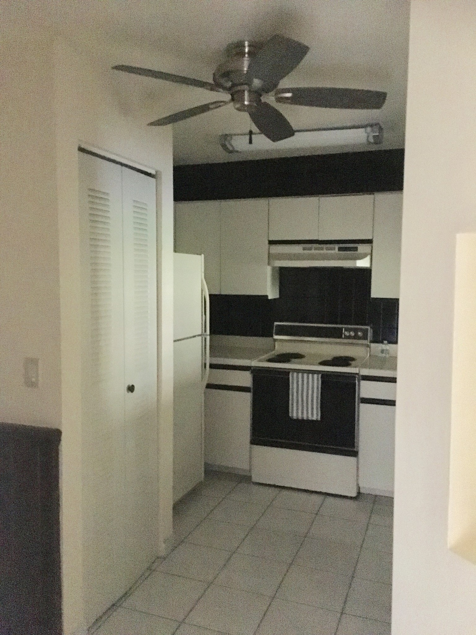 Kitchen with Washer/Dryer in closet - 15489 Miami Lakeway N
