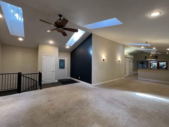 Building Photo - 2,280 Square Foot modern Three bedroom two bath multi  level home, large yard, decks, cathedral c...