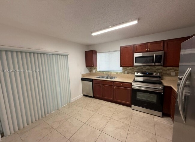Building Photo - 14465 SW 139th Ave Cir E