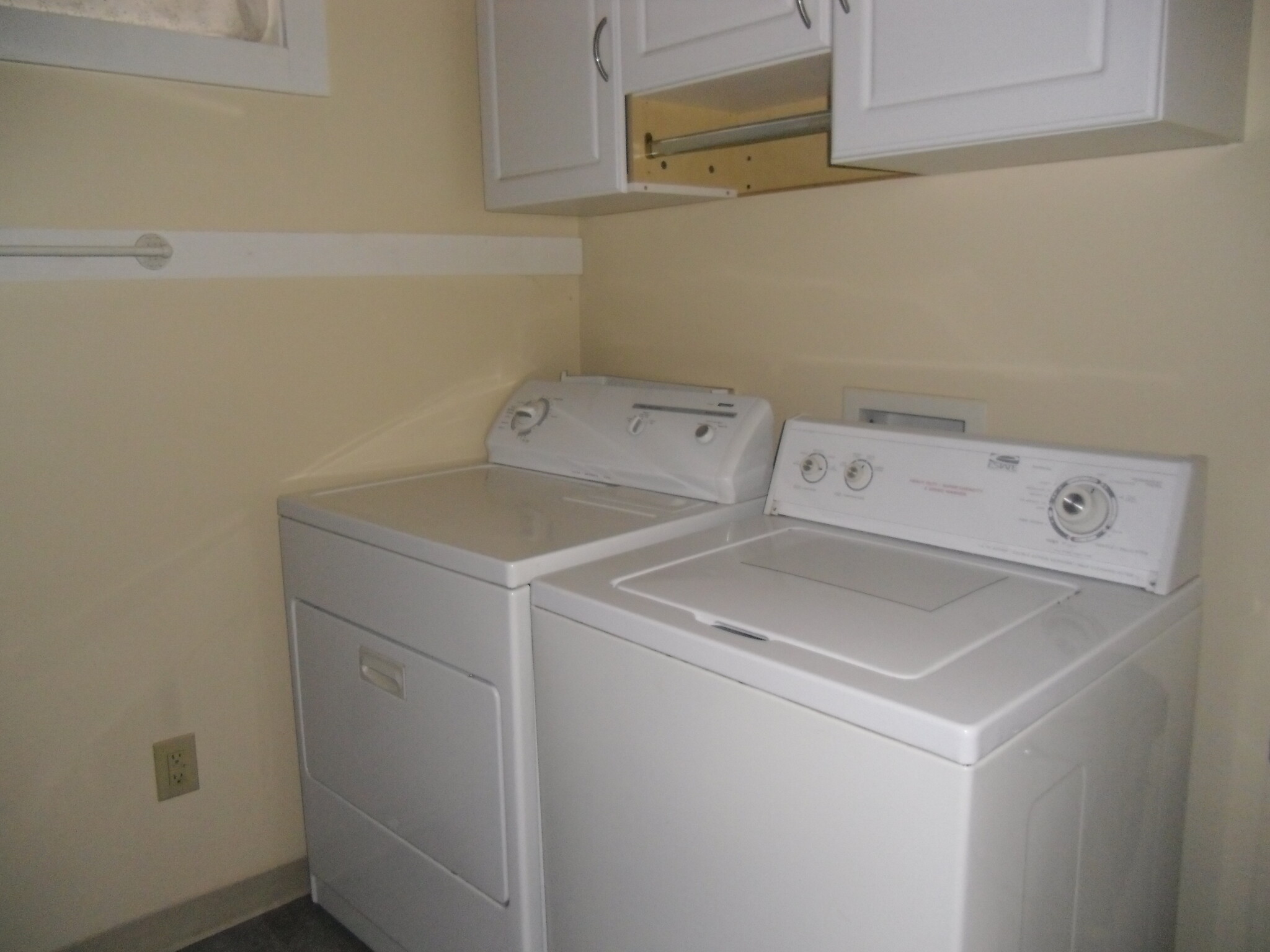 Washer and dryer in bathroom - 9506 Sand Ridge Rd