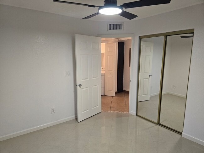 Building Photo - UPGRADED CONDO READY TO MOVE INTO!