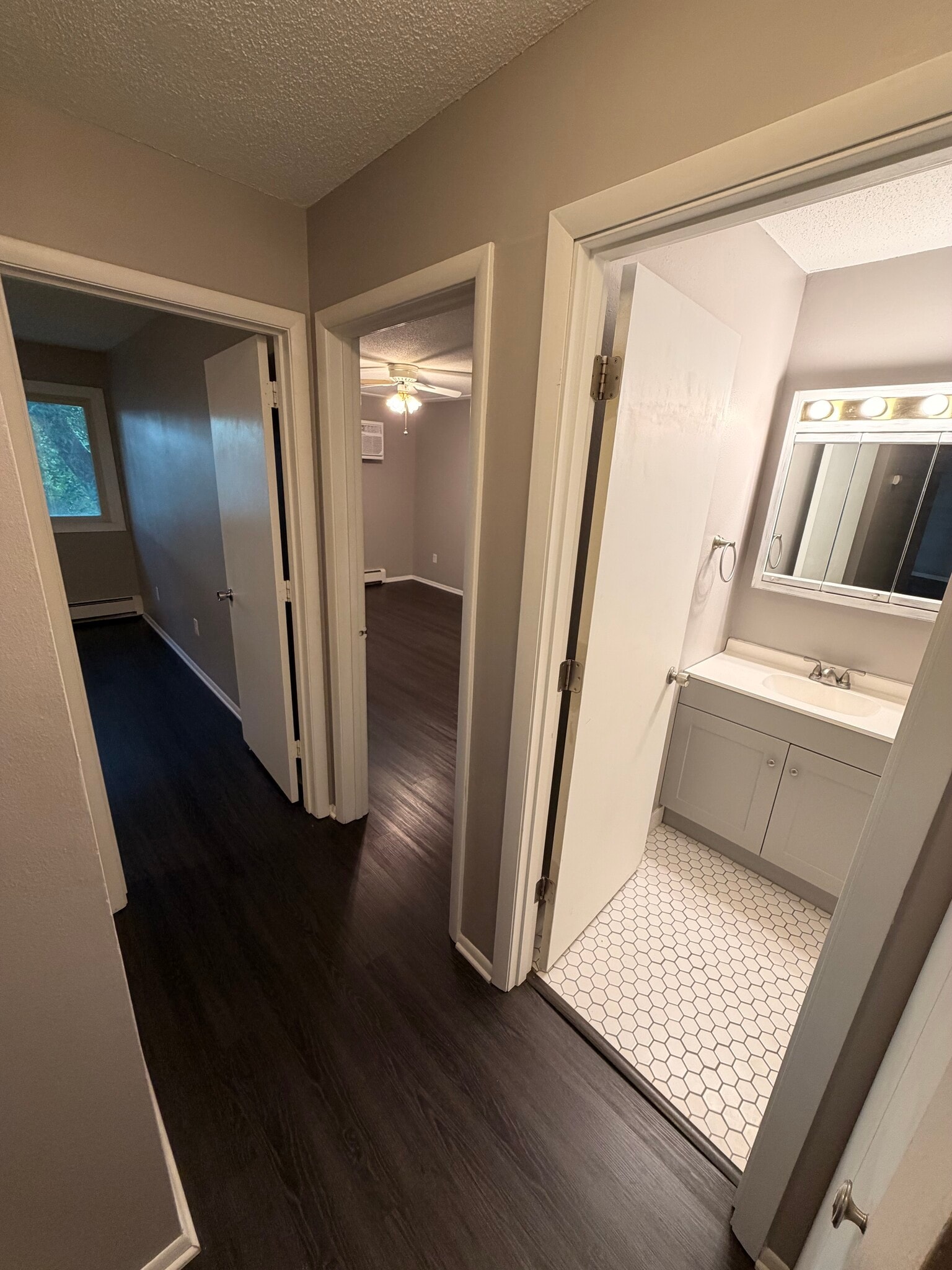 Entry hall. L-R, 2nd BR, M-BR and 2nd bathroom. - 8935 Old Cedar Ave S
