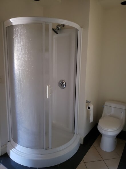 Guest Bathroom, Comode & Shower Enclosure. Porcelain Flooring - 54 Veres Dr