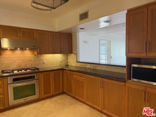 Building Photo - 8238 W Manchester Ave