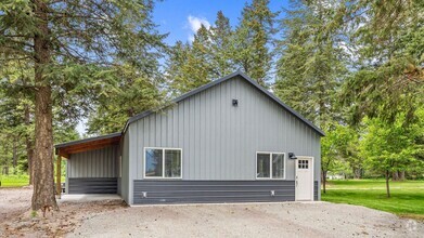 Building Photo - New home with a country feel- vaulted ceil...