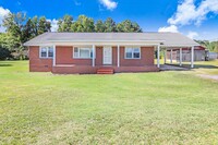 Building Photo - Spacious BRICK RANCH on large lot *GREAT G...