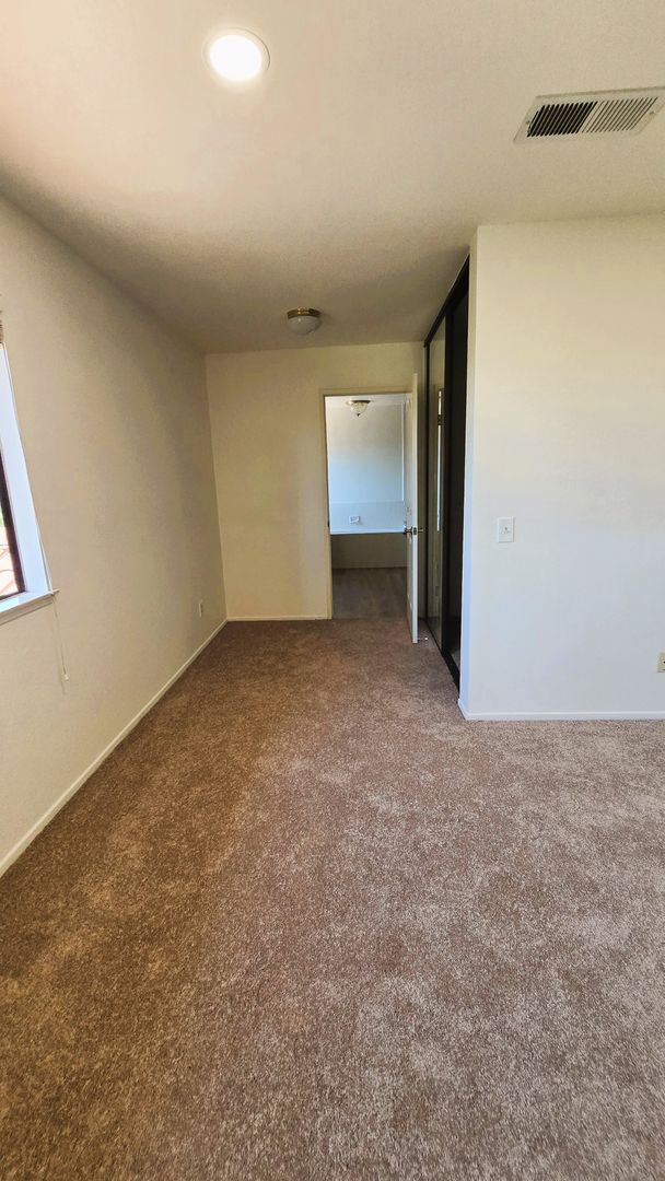 Building Photo - "Spacious, Sunlit Home in a Peaceful Ranch...