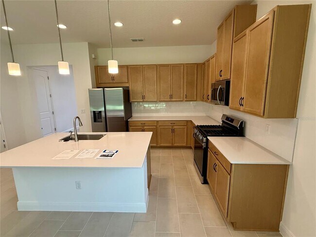 Building Photo - 5211 Buttonsage Dr