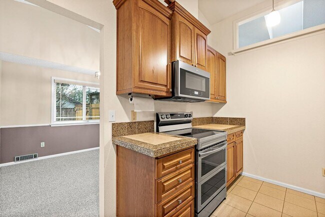 Building Photo - Charming Tacoma Home with A/C, RV Parking, Workshop & Skylit Living Room