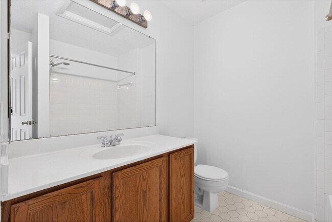 Building Photo - 3BR Townhome in Russett | 3 Levels | Walkout Basement + Deck | $2,400/mo** Beautiful 3-level town...