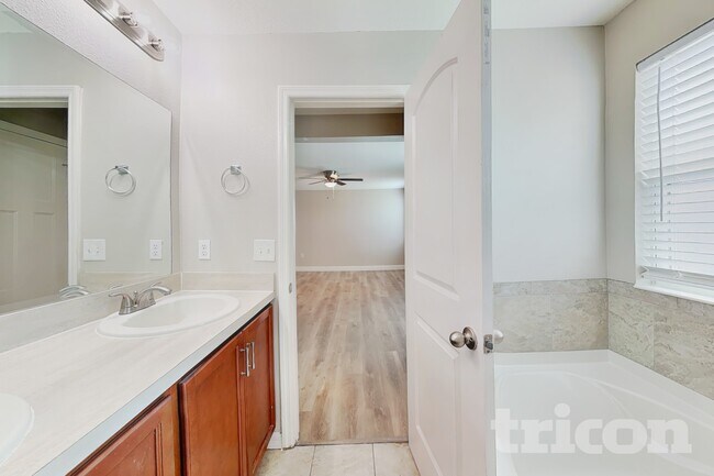 Building Photo - 7105 Feather Wood Dr