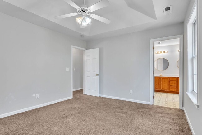 Building Photo - Beautifully Appointed 4BR Home Featuring a Screened Porch, Spacious Living Areas & Community Pool...