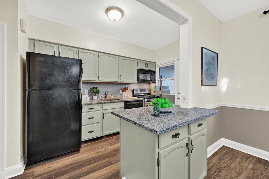 Galley Kitchen with plenty of cabinet and counter space - 104 Westowne Rd