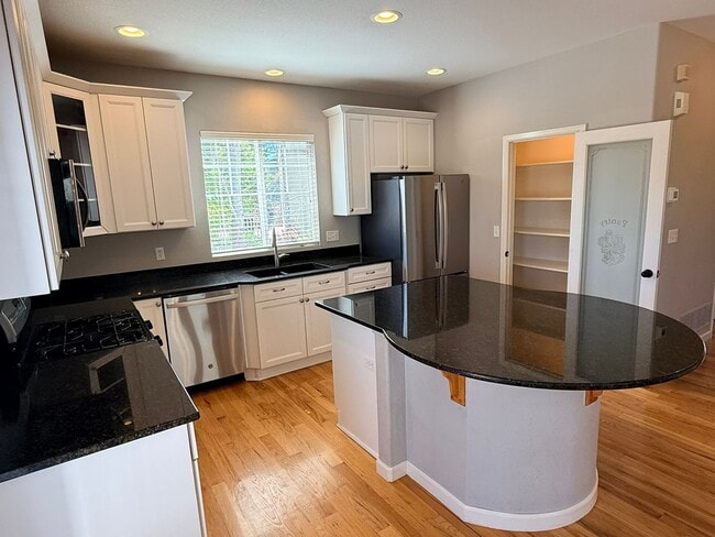 Building Photo - Modern 4-Bedroom Home in Renaissance Neighborhood Near Trails