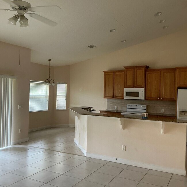 Building Photo - 3/2/2 RENTAL HOME AVAILABLE OFF DEL RIO AND PT ST LUCIE BLVD.