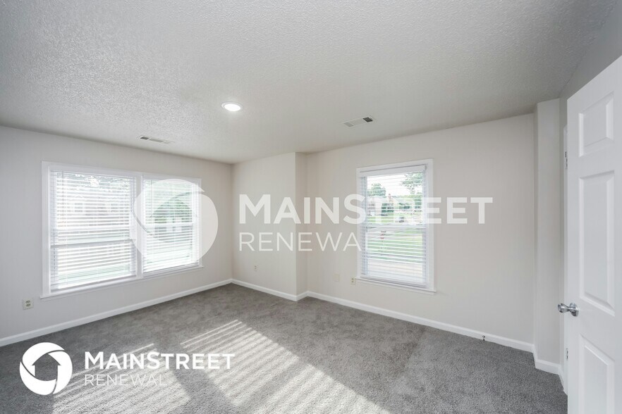 Building Photo - 8849 Woodmark Dr