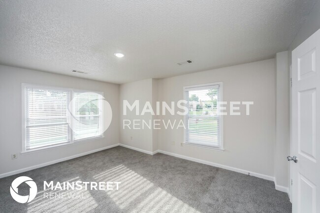 Building Photo - 8849 Woodmark Dr