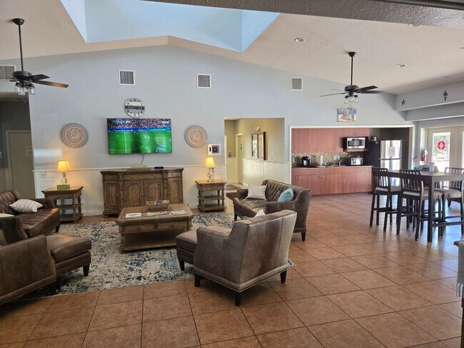 Building Photo - Freshly Painted 4BR/2BA Pool Home with Screened Pool & Spa – Move-In Ready!